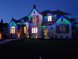 soffit lighting compliments landscape lighting for this stunning home